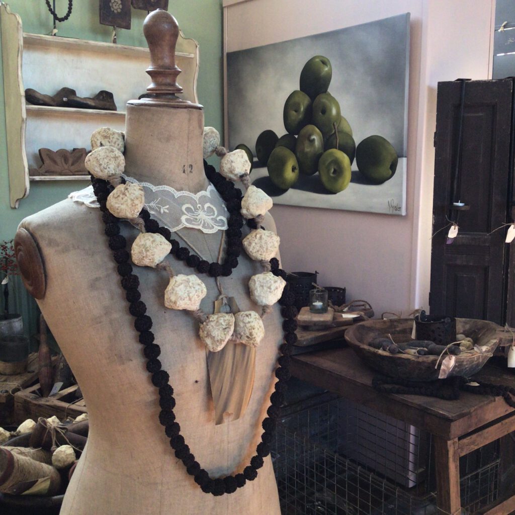 Stockman paspop met olijf schilderij